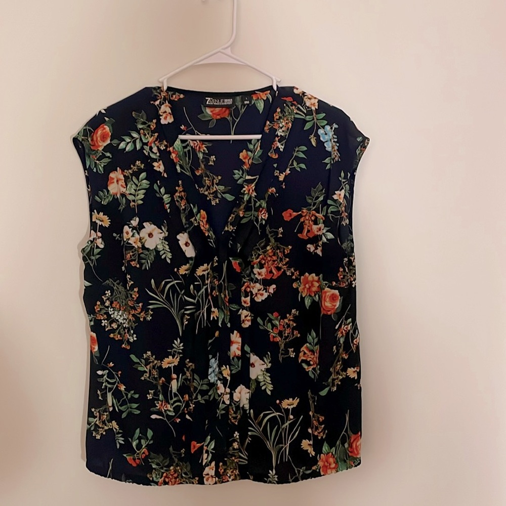 Feeling floral? Pleated v-neck is perfect for spring and summer - great colors!